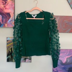 Green top with flower sleeves